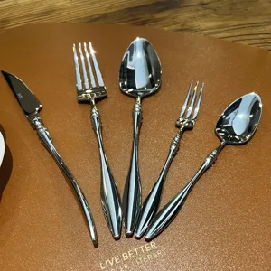 Stainless steel Western cutlery set including knife fork and spoon for kitchen dining.