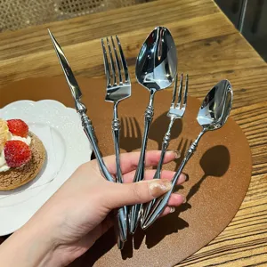 French style 304 stainless steel cutlery set, elegant silver tableware detail view.