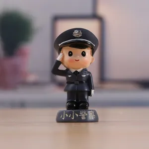 Closeup view of the miniature resin police figurine, featuring detailed uniform and a saluting pose.