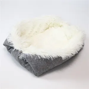 Detailed view of cozy white long plush interior and soft grey fabric exterior pet bed.