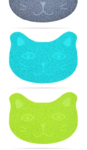 Vista detallada de alfombrillas de arena para gatos de PVC con forma de gato colorido.