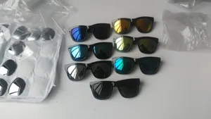 Stylish square sunglasses for women with colorful reflective lenses, trendy summer eyewear.