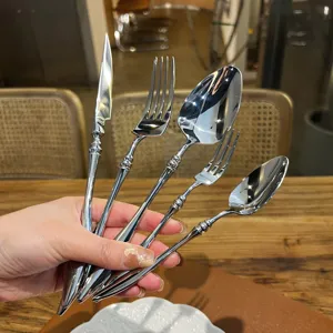 French style stainless steel cutlery set, elegant fork spoon and knife for dining room.