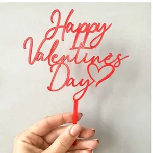 Red acrylic Happy Valentines Day cake topper for romantic party dessert table decoration.