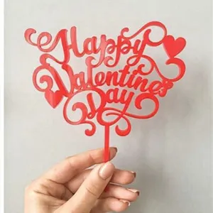 Red acrylic Happy Valentine's Day cake topper for romantic party dessert table decor.