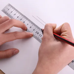 Stainless steel metal straight ruler with clear metric scale for office and school use.