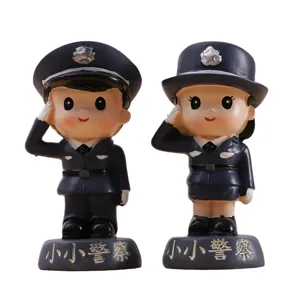 Mini police couple figurine model for car dashboard decoration and creative holiday gift.