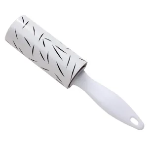 Portable mini lint roller with white handle and patterned sticky paper for clothing hair removal.