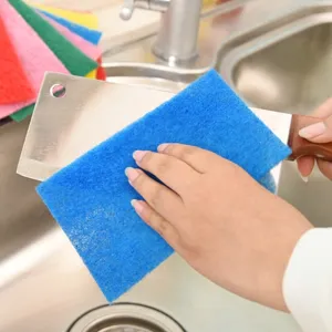 Thickened colorful scouring dishwashing sponge cloth for kitchen cleaning and grease removal.
