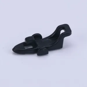 Detailed view of black plastic fishing rod lure hook keeper accessory for sea fishing gear.