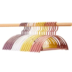 Multicolor plastic clothes hangers, heavy-duty non-slip wide shoulder coat hangers for home use.