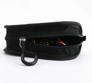 Detail view of the black fishing lure bag zipper opening, portable tackle storage pouch for hooks.