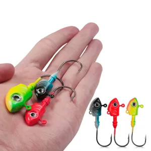 Fishing jig head hooks set with colorful painted fish head design and sharp hooks for angling.