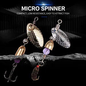 Metal spinnerbait fishing lure with feathered treble hook for trout bass casting fishing.