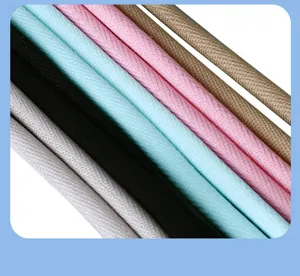 Close-up detail shot of colorful braided lanyards and straps, showcasing texture and material.