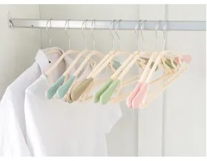Adult non-slip plastic clothes hangers with wide shoulders and textured anti-slip ends.