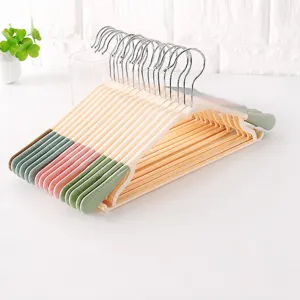 Adult seamless plastic clothes hangers with non-slip particles and 360-degree swivel hook.