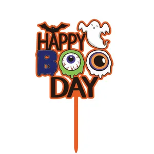 Halloween taart topper met spook en vleermuis design voor griezelig griezelfeestje.