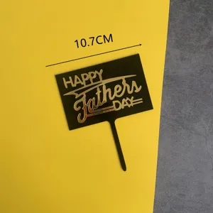 Acrylic Father's Day cake topper with gold lettering, perfect for dad's birthday party decor.