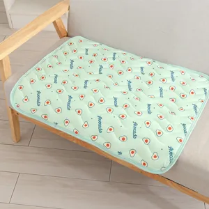 Breathable cooling pet mat with cute avocado print and ice silk fabric for summer comfort.