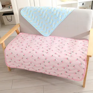 Ice silk pet cooling mat detail, breathable summer dog and cat sofa cushion with cute fruit prints.