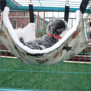 Plush pet hammock for cats and small animals, cozy hanging bed with secure straps and hooks.