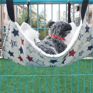 Detailed view of hanging pet hammock with star pattern and plush inner lining for cats dogs.