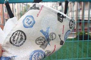Pet cat hammock hanging plush sleeping bed with vintage Paris postal stamps canvas design.