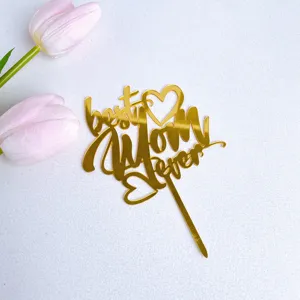 Gold acrylic Best Mom Ever cake topper, perfect for Mother's Day party decorations and dessert table styling.