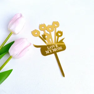Gold acrylic Mother's Day cake topper with tulip flower bouquet design and love mom text.