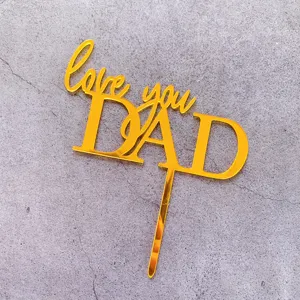 Gold acrylic Love You Dad cake topper detail, perfect for Father's Day celebration.