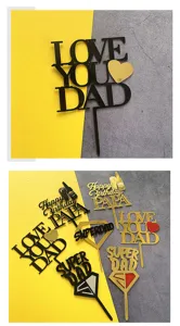 Acrylic Father's Day cake topper detail, black and gold mirror design for party.