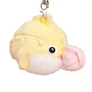 Llavero de monstruo de peluche amarillo lindo con accesorio rosa, colgante suave.