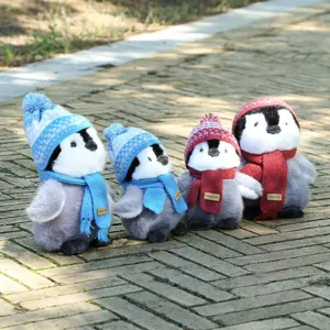 Cute plush penguin stuffed toys set with knitted hats and scarves, perfect kids gift.