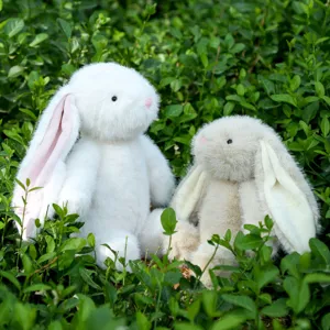 Cute stuffed rabbit plush toy detail showing soft bunny dolls for kids holiday gift.