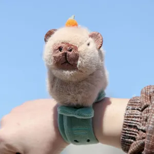 Cute capybara plush slap bracelet detail shot, soft plush material, fun wrist toy accessory for kids.