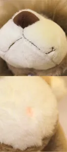 Dschungel-Serie Plüschlöwe Spielzeug Detail Nahaufnahme mit weichem Fell und feinen Nähten.
