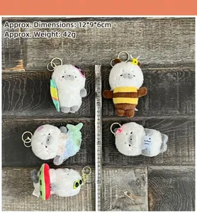 Cute marine animal costume seal plush keychain and bag charm, soft stuffed doll pendant decor.