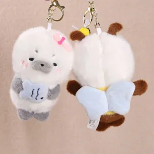 Cute seal plush toy keychain detail view, soft stuffed animal bag charm accessory pendant.