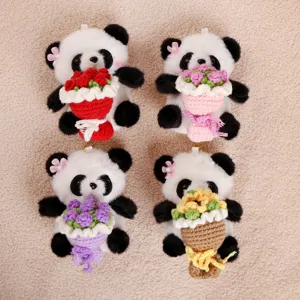 Cute crochet panda plush keychain holding colorful flower bouquet, soft handmade toy bag pendant.