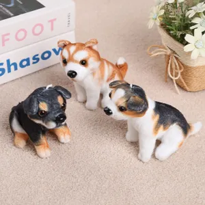 Close-up detail of three cute simulation puppy figurines with realistic plush design for decor.