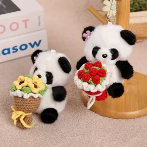 Plush panda keychain holding crochet flower bouquet cute stuffed animal bag charm accessory detail.