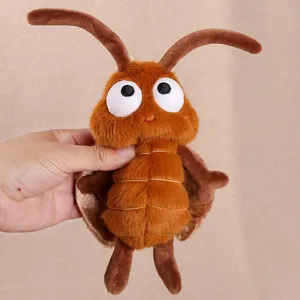 Cute cartoon cockroach plush toy keychain pendant, soft insect doll bag accessory detail.