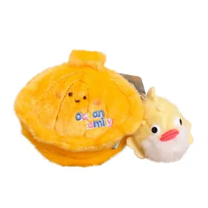 Cute plush shell nest keychain with little duck pendant, soft cartoon toy bag charm.