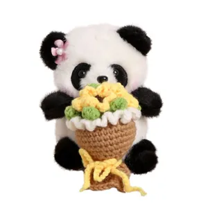 Cute crochet panda plush toy pendant holding a yellow flower bouquet, soft stuffed animal gift.
