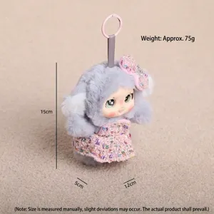 Cute plush vinyl doll keychain pendant with sparkly dress and bow, perfect bag accessory.