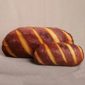 Primo piano che mostra la consistenza morbida e le doppie misure dei cuscini di pane.