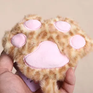 Soft cute cat paw plush toy pendant with leopard print and pink pads for daily bag decoration.