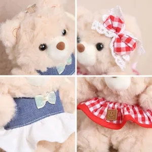 Close-up details of cute plush teddy bear toy wearing lovely plaid and denim skirts.