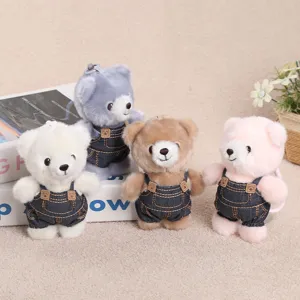 Portachiavi orsetto di peluche carino con salopetta in denim, ciondolo morbido per borse.